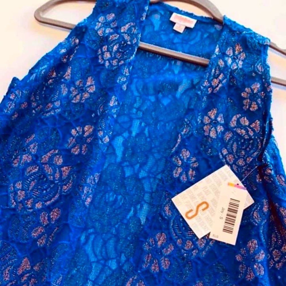 Beautiful LuLaRoe blue with gold-ish sparkles lace “Joy” duster vest.
